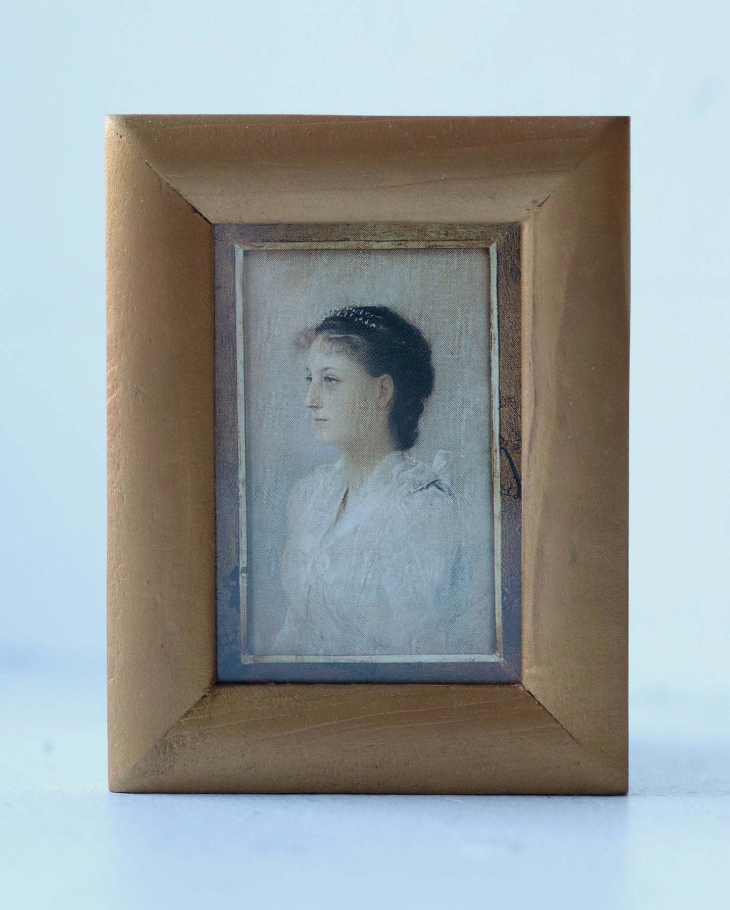 Portree/ print väikese kuldses raamis