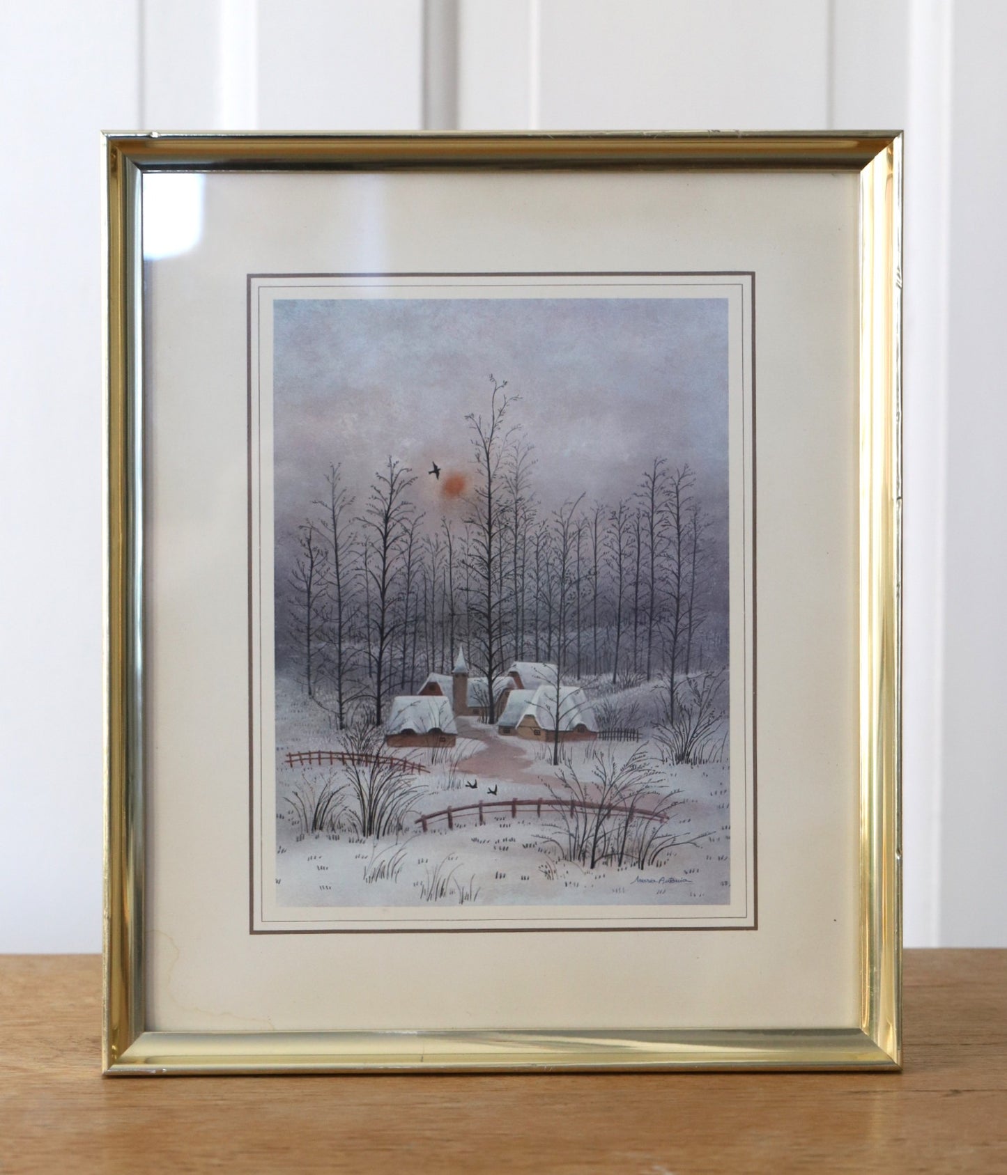 Talvine pilt kuldses raamis