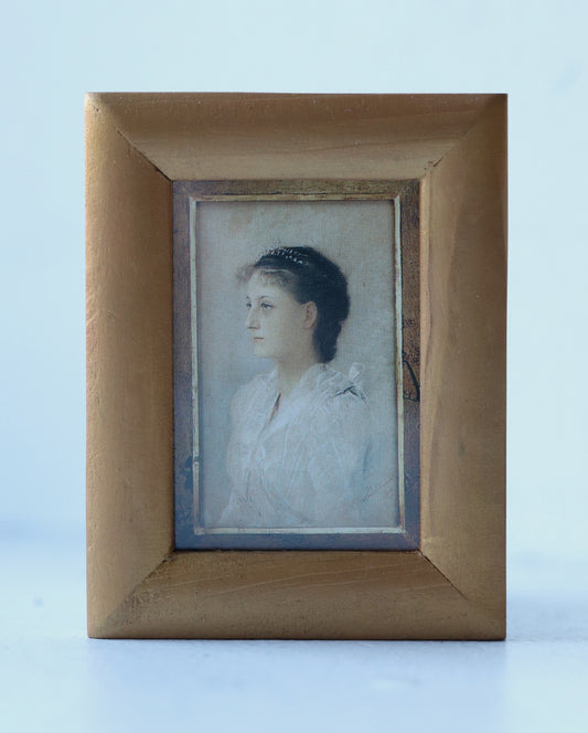 Portree/ print väikese kuldses raamis